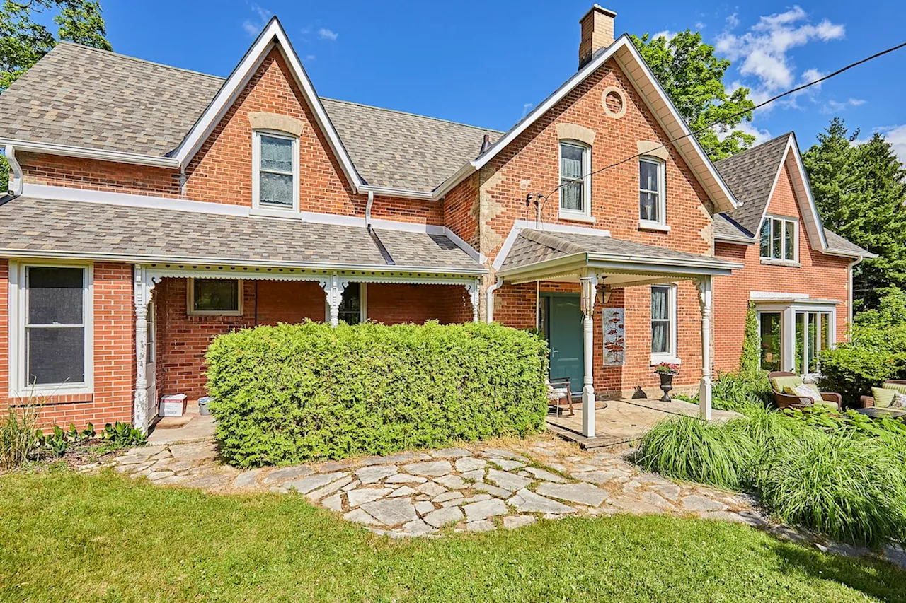 Red brick farmhouse a meeting place for a blended family