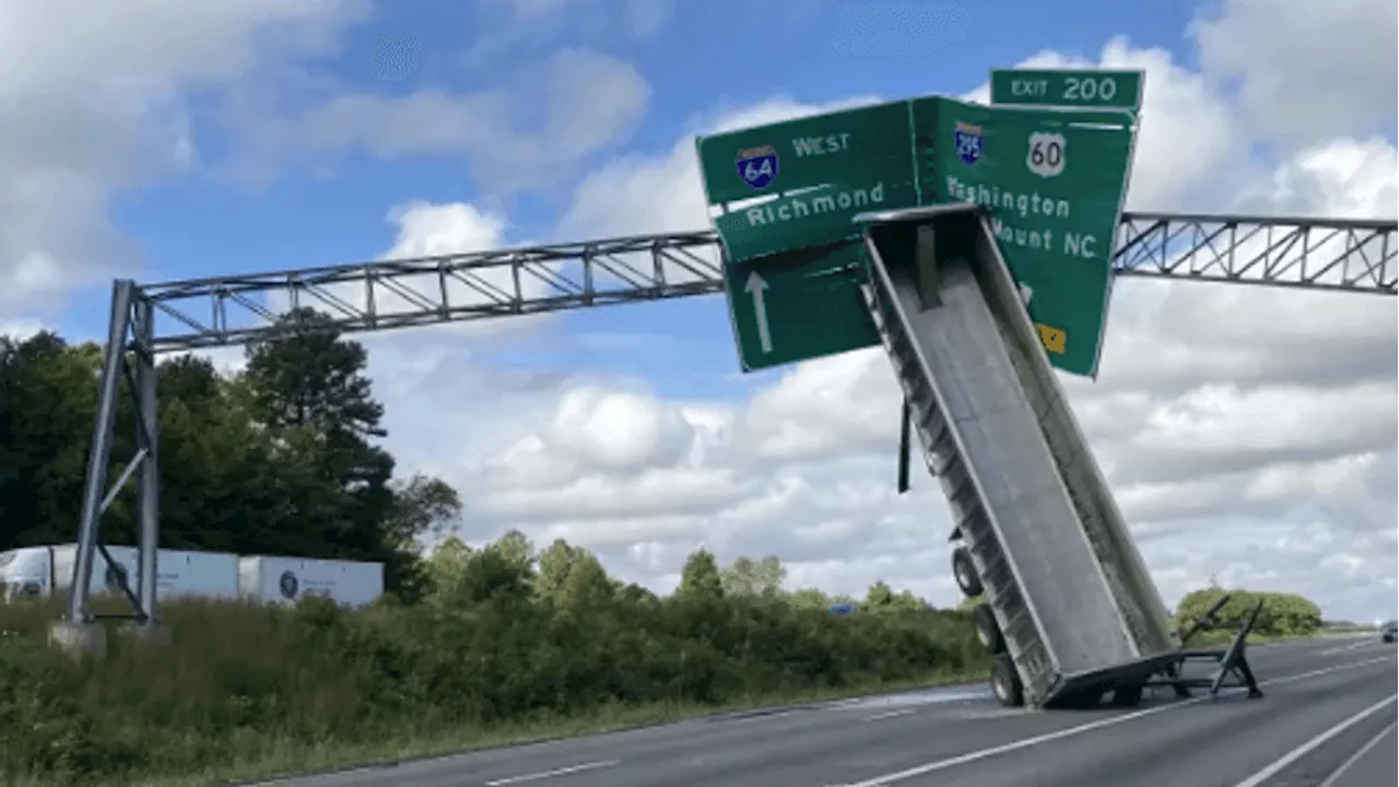 Driver charged with reckless driving after tractor-trailer hits Virginia highway sign