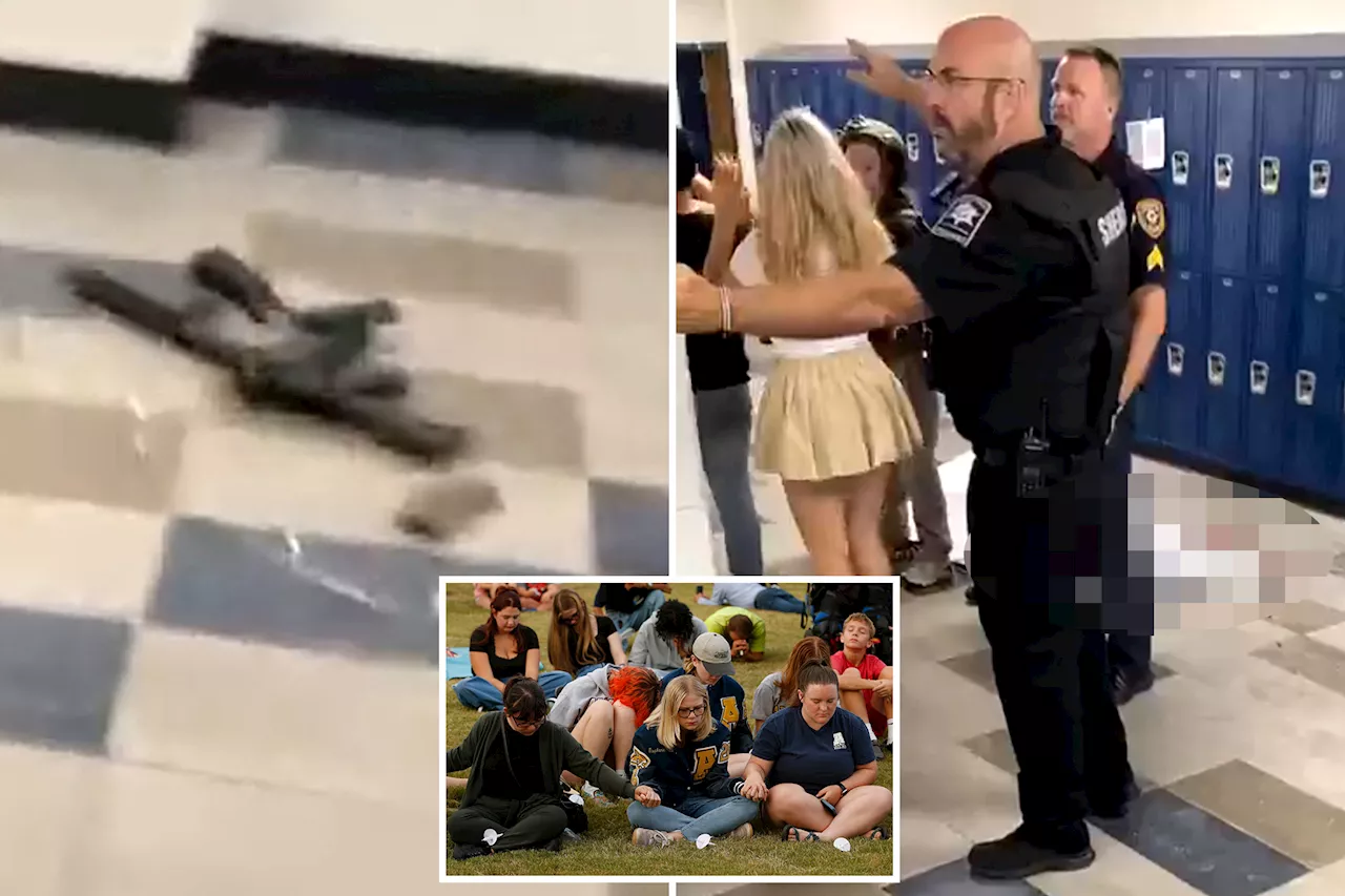 Georgia students evacuated from hallway where deadly mass shooting took place — with killer's gun still on the floor: chilling video