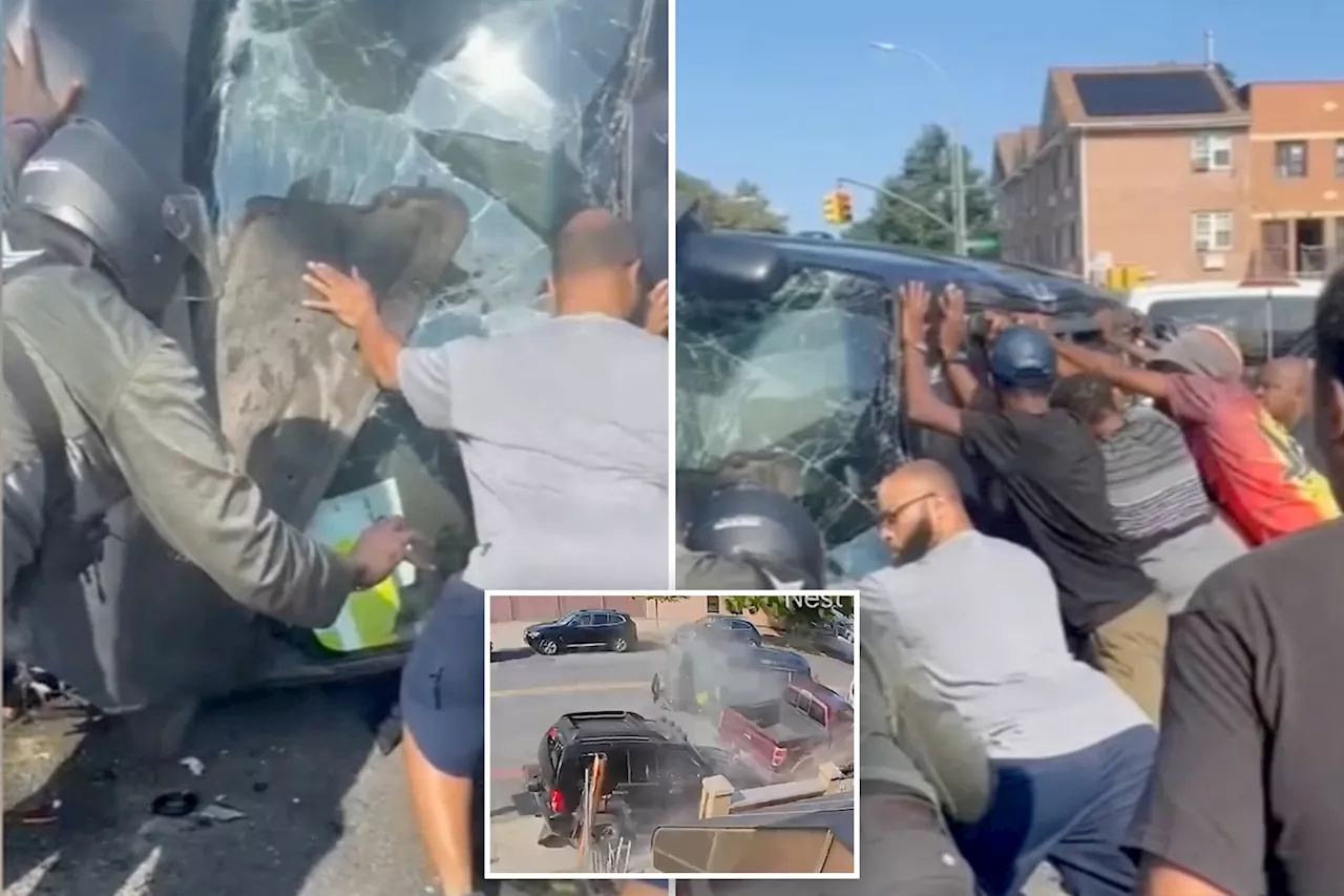 Video shows Brooklyn bystanders overturn crashed minivan— to find booze allegedly drunk by driver