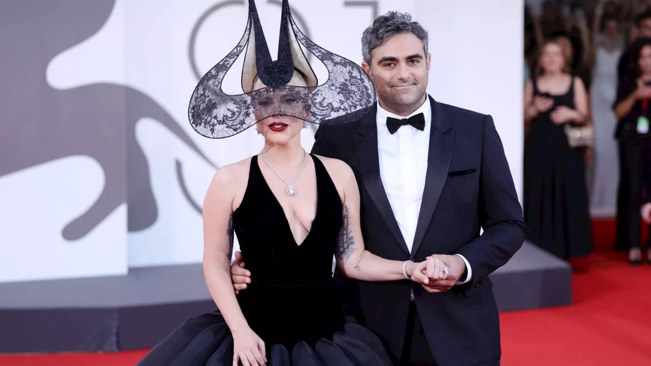 Lady Gaga flashes huge engagement ring on red carpet