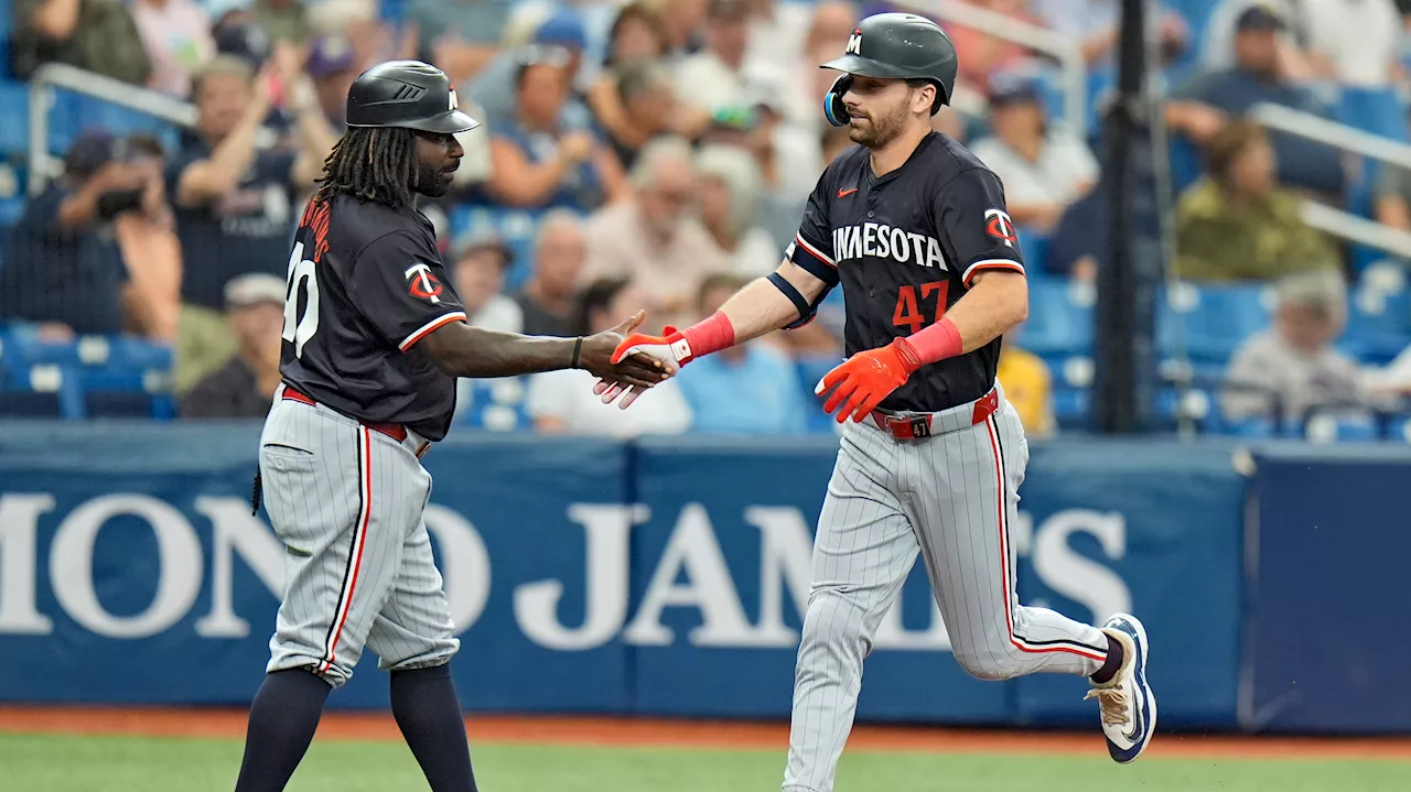 Julien's three-run blast sends Twins past Rays