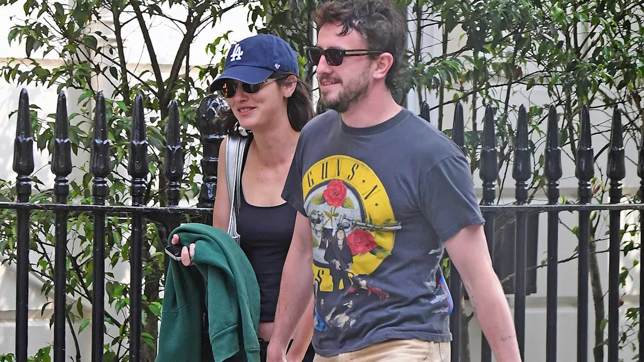 Paul Mescal puts on a loved-up display with new girlfriend Gracie Abrams as they hold hands on a...