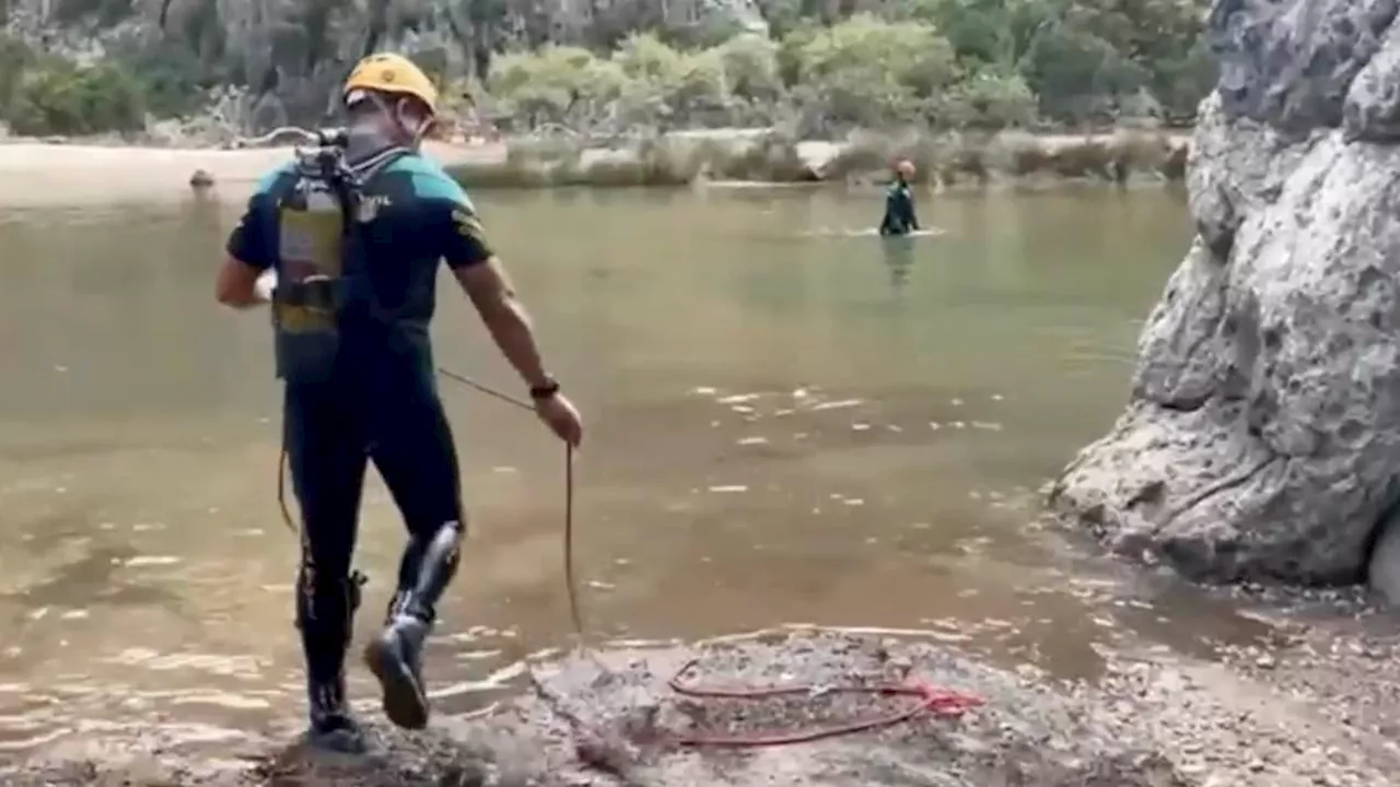 Police searching for British man swept away by flood waters along with his girlfriend while hiking...