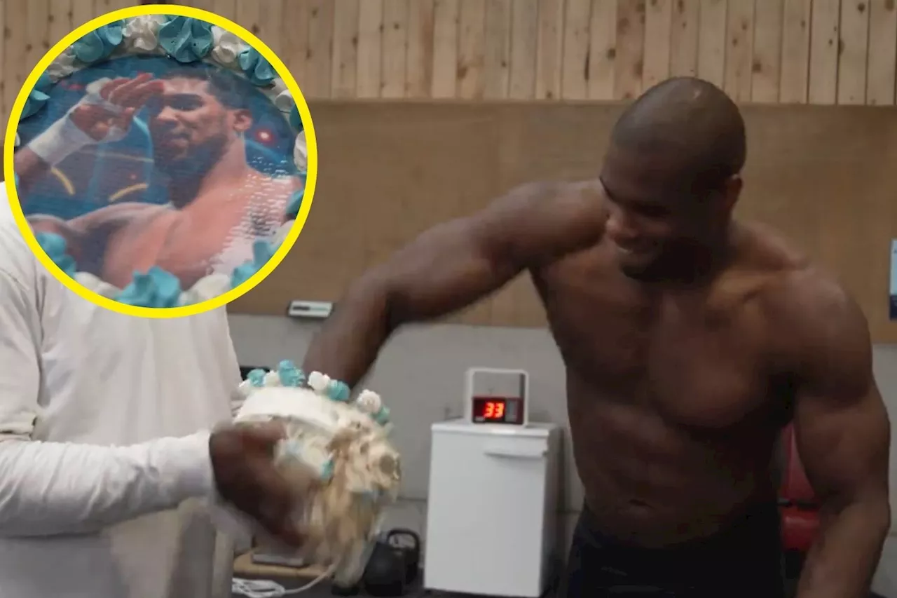 – Daniel Dubois celebrates 27th birthday by punching cake decorated with Anthony Joshu...