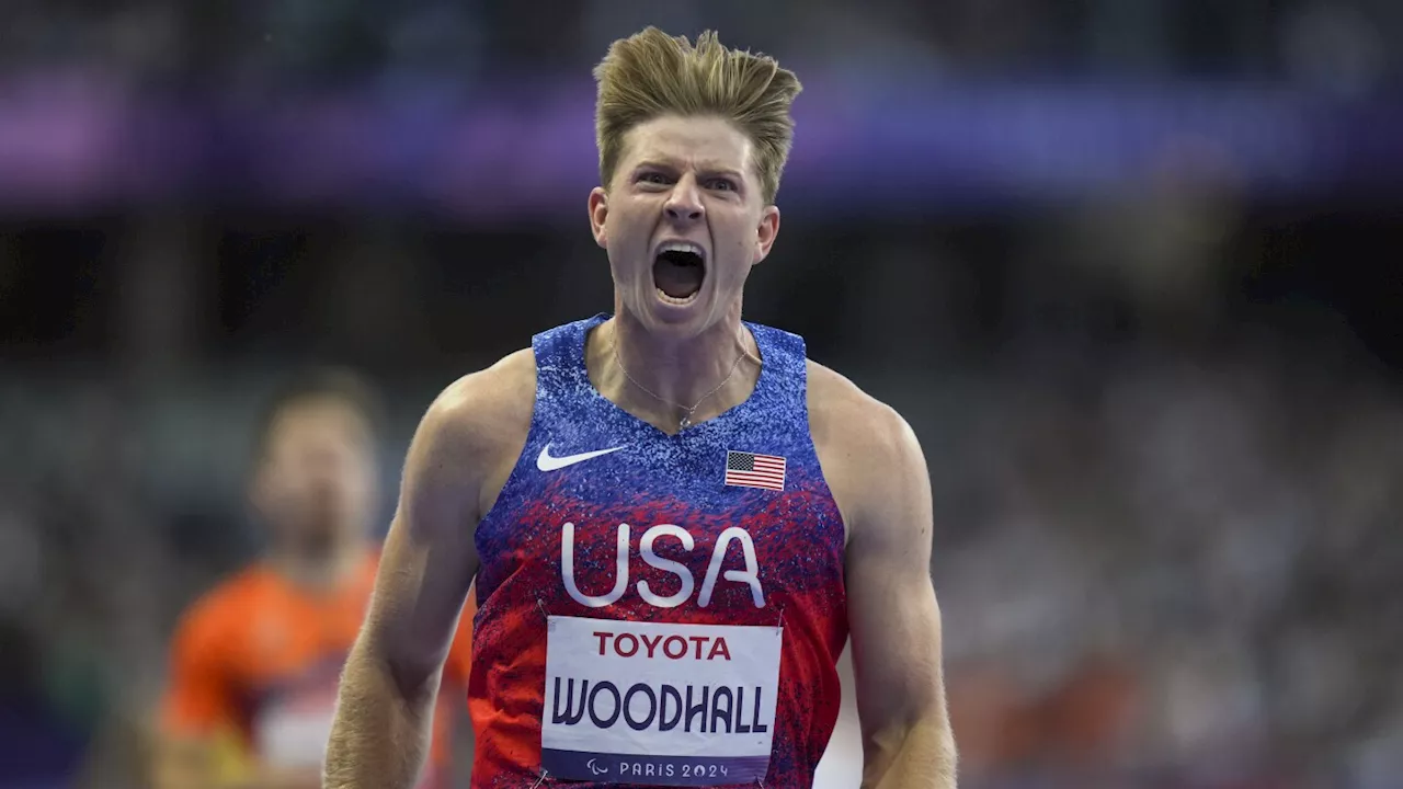 Hunter Woodhall wins Paralympic sprint title to join his wife as a gold medalist