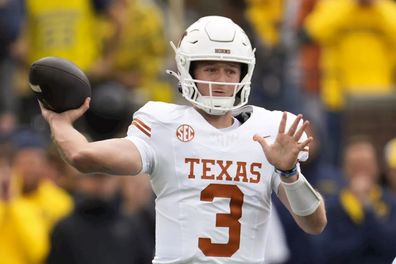 Quinn Ewers throws for 3 touchdowns as No. 3 Texas pounds No. 10 Michigan 31-12