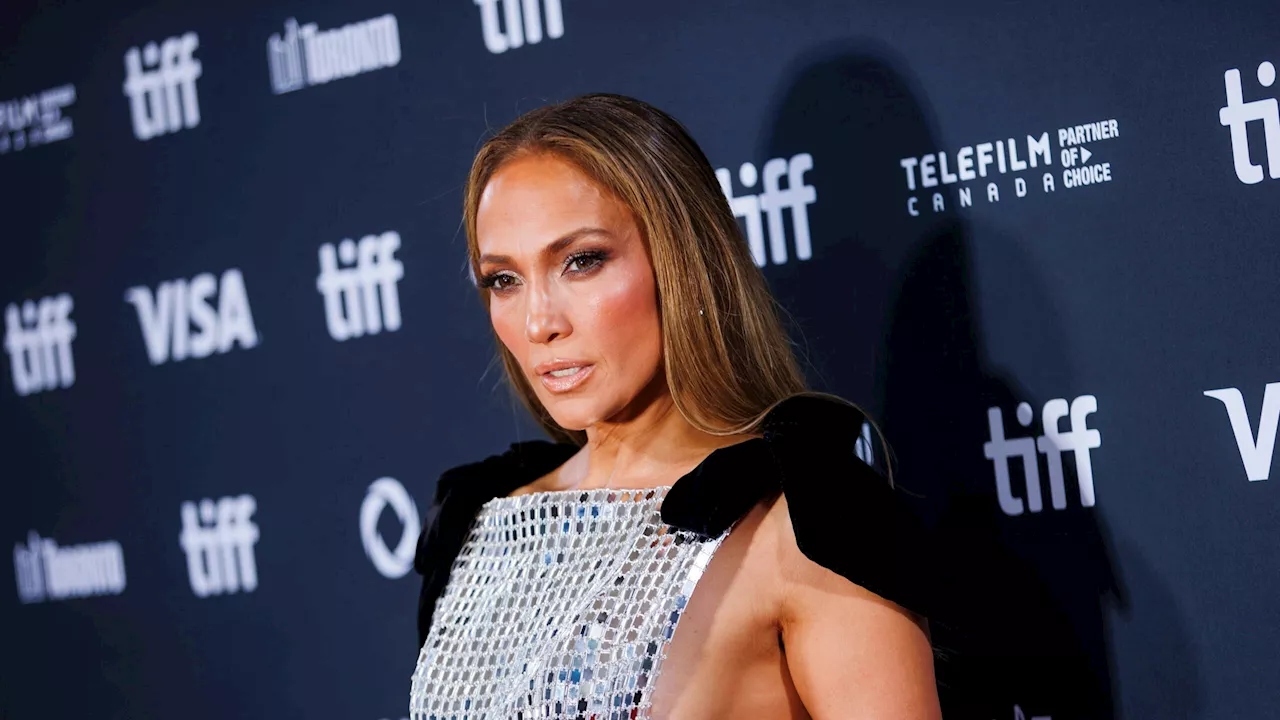 Jennifer Lopez Attends Unstoppable Premiere With Matt Damon, Ben Affleck Stays At Home