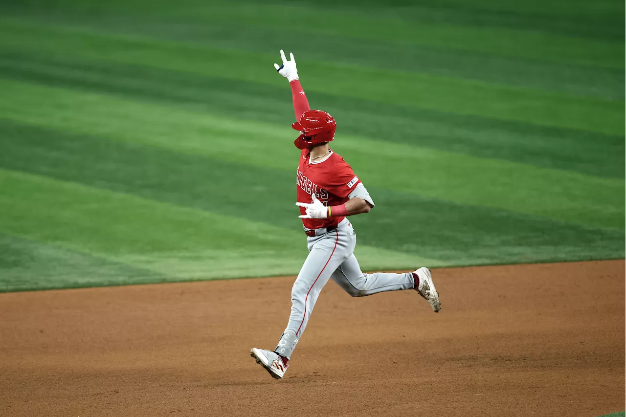 Italian rookie Sam Aldegheri gets 1st major league victory, helping the Angels beat the Rangers