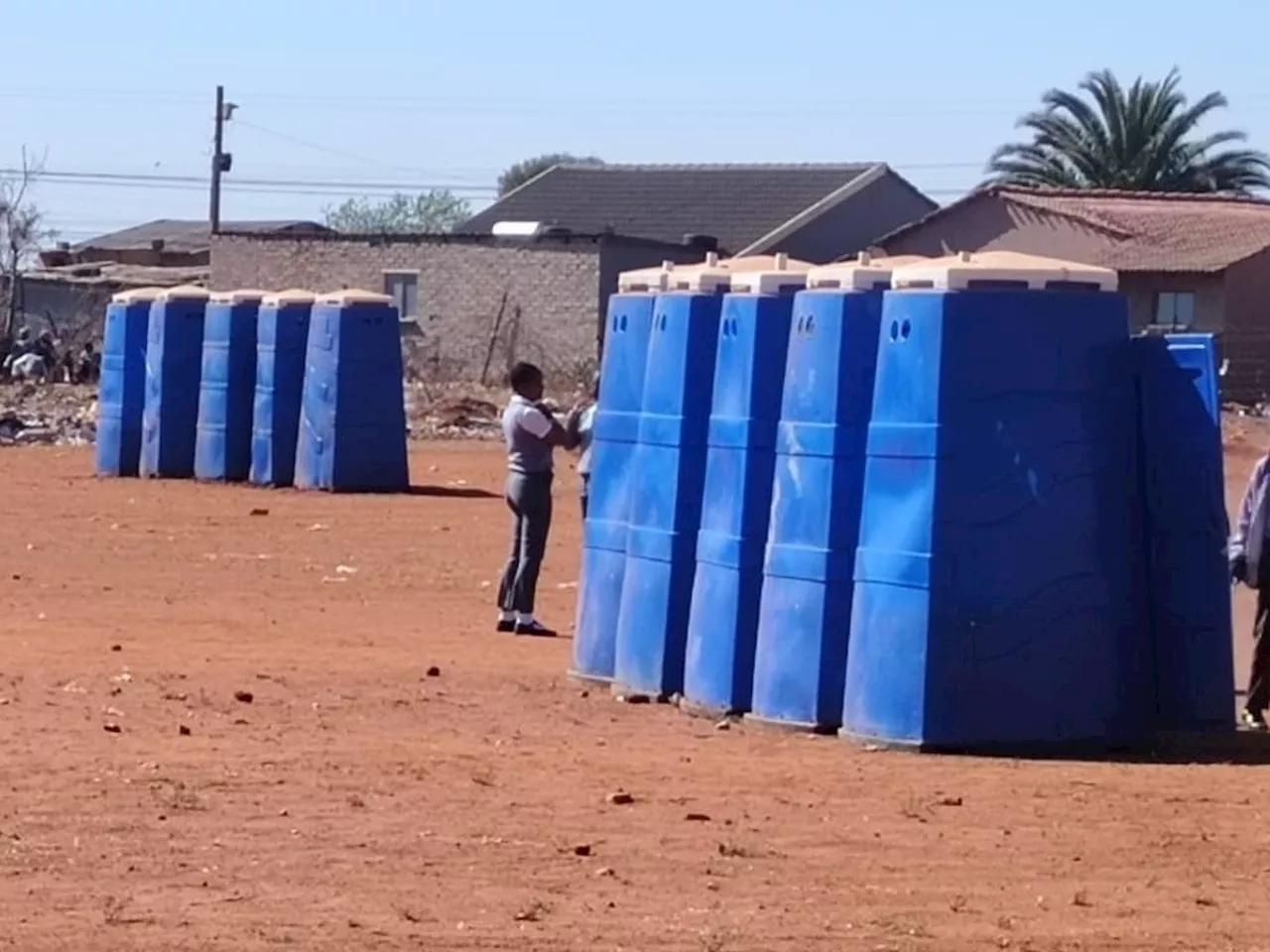 Pupils share 10 portable loos as construction mafia allegedly delays new state-of-the-art building