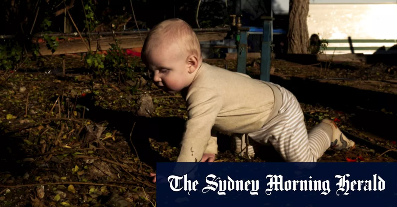 In the shadow of a mining giant, children crawl in poison