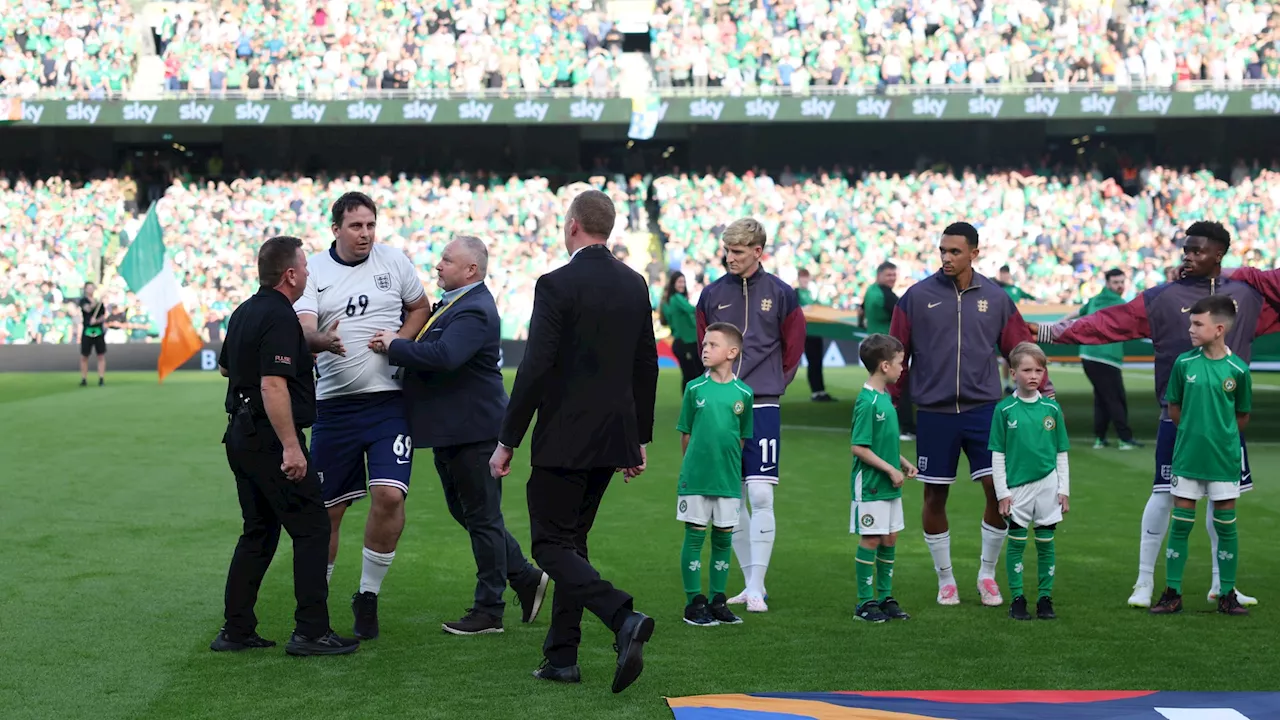 England team gatecrashed by YouTube prankster on pitch moments before Ireland clash...