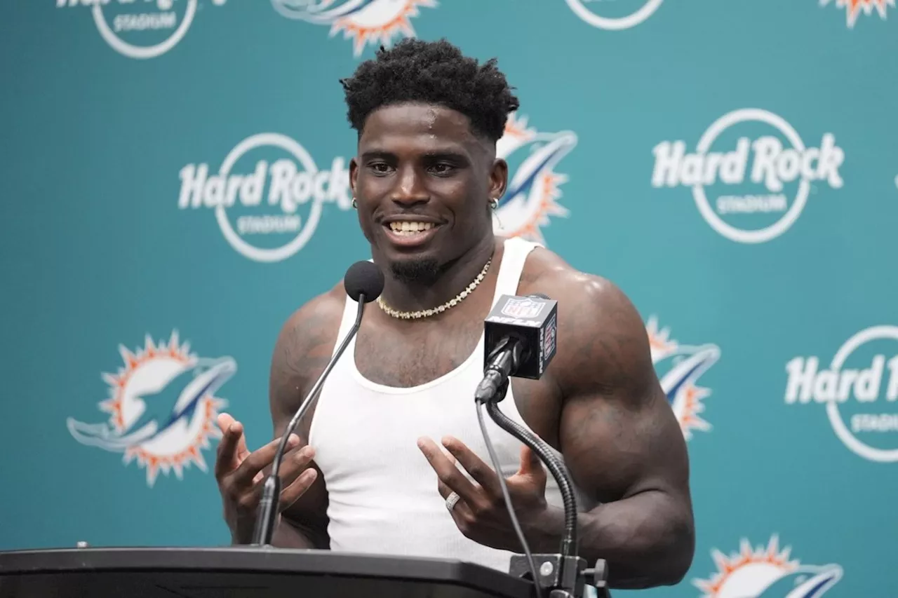 Tyreek Hill is detained by police before Dolphins game; 1 officer is subsequently placed on leave