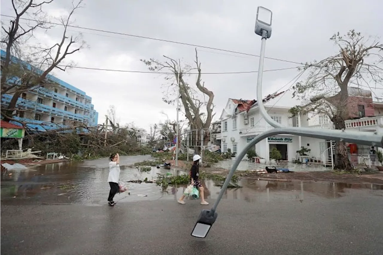 Typhoon Yagi kills 14 in Vietnam as officials warn of heavy rain that can cause flooding