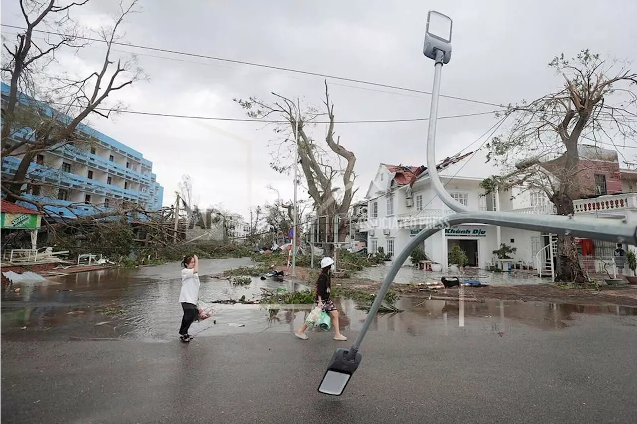 Typhoon Yagi kills 14 in Vietnam as officials warn of heavy rain that can cause flooding