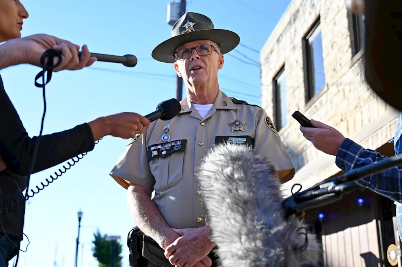 Authorities find an SUV and a rifle while searching for the Kentucky highway shootings suspect