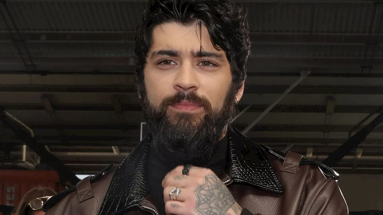 Zayn Malik looks worlds away from One Direction days as he shows off bushy beard alongside Camilla Cabello...