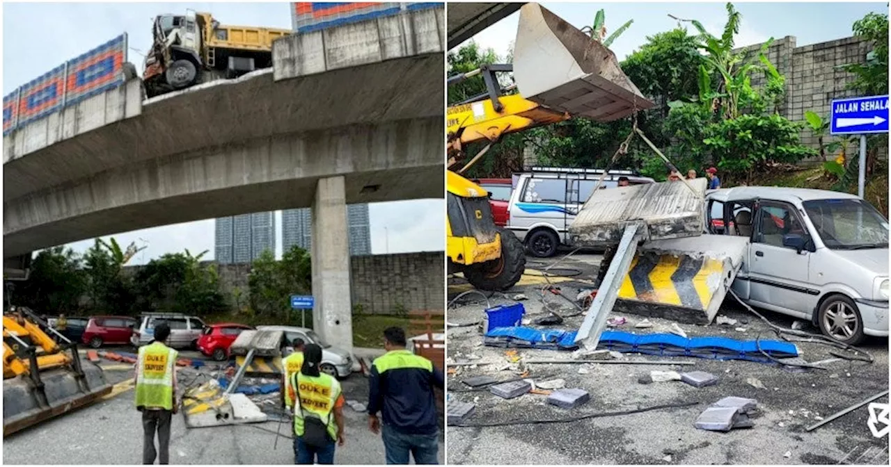 Lorry Crashes Into Concrete Barrier on DUKE Expressway & Causes it to Fall on Parked Kenari Underneath