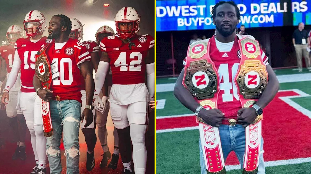 Terence Crawford carries custom-made belt as he walks out Nebraska Huskers in front of 87,000 fans ...