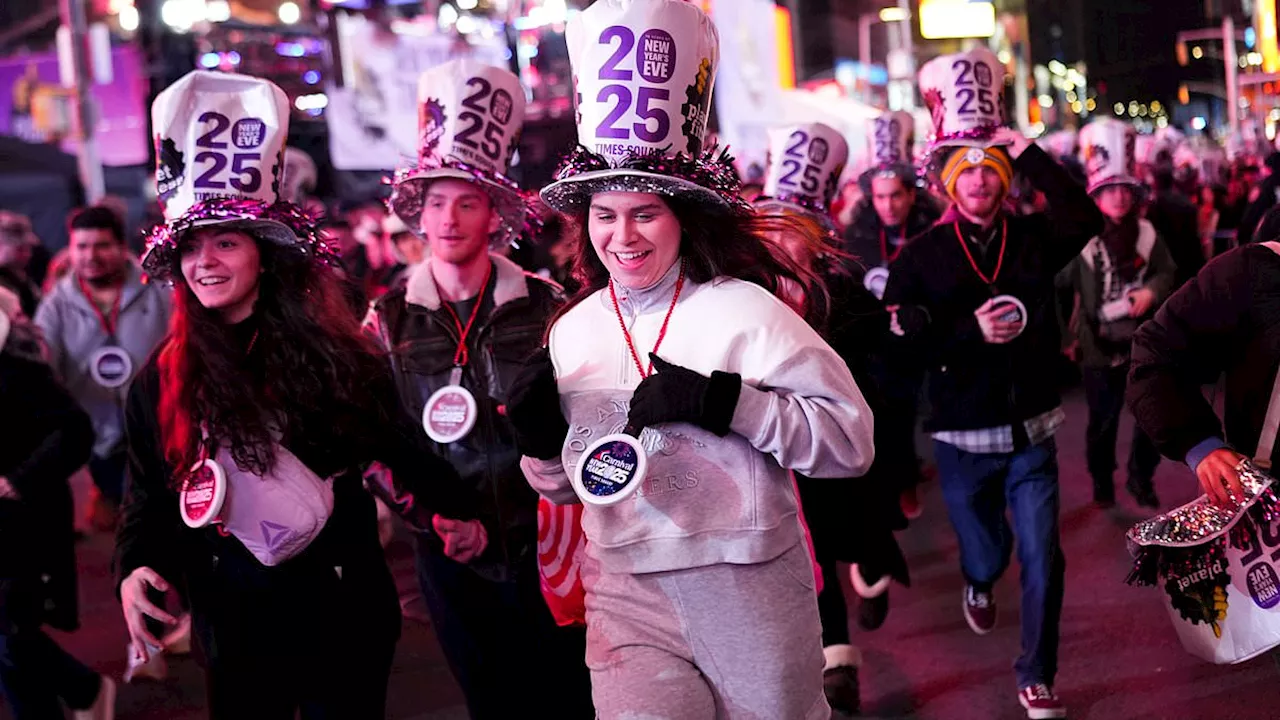 New York City Celebrates New Year's Eve Despite Deluge