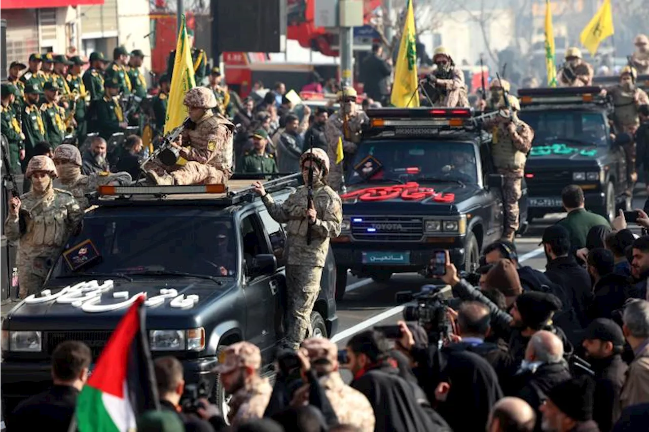 Iranian militias hold an anti-Israeli rally to show solidarity with victims