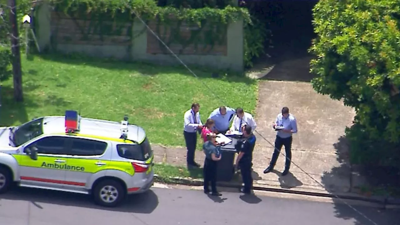 Police Officer and Man Shot in Brisbane Backyard