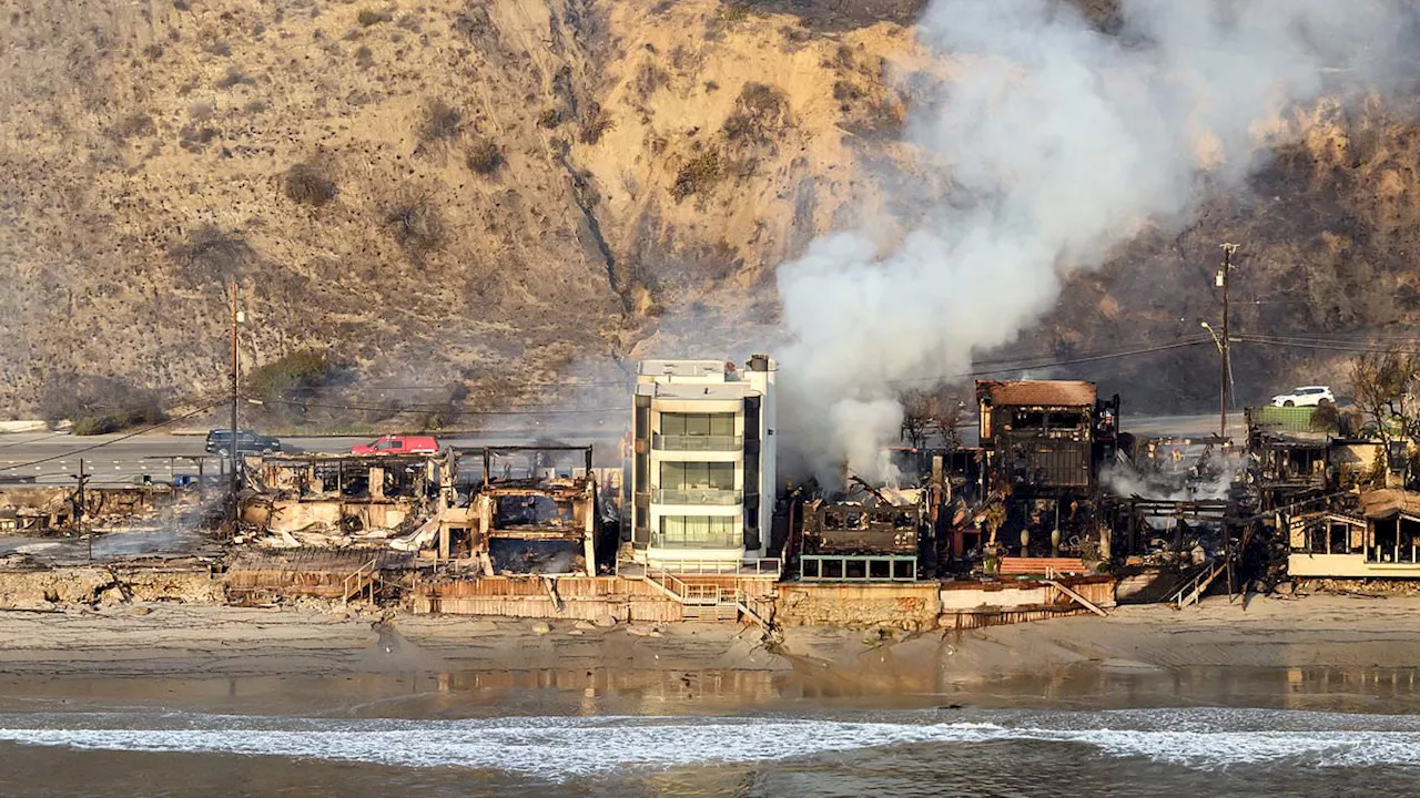 The last house standing after California fires: Miracle as Malibu home is left intact while...