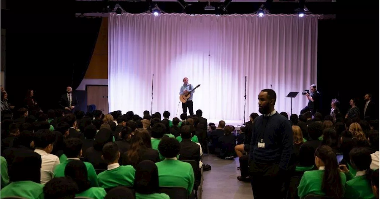 Pupils 'blown away' as Ed Sheeran appears at school for surprise performance