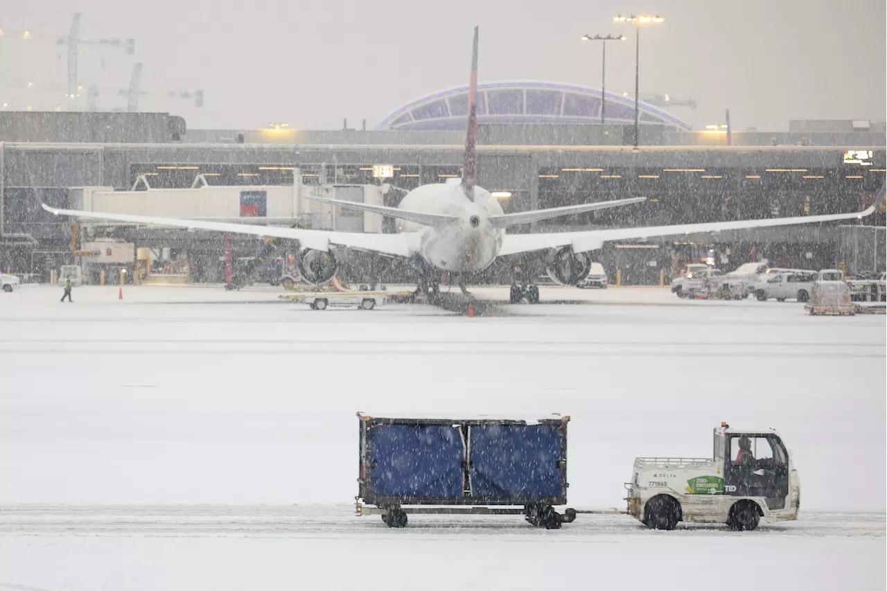 Delta passengers in Atlanta forced to evacuate plane on emergency slides amid winter storm