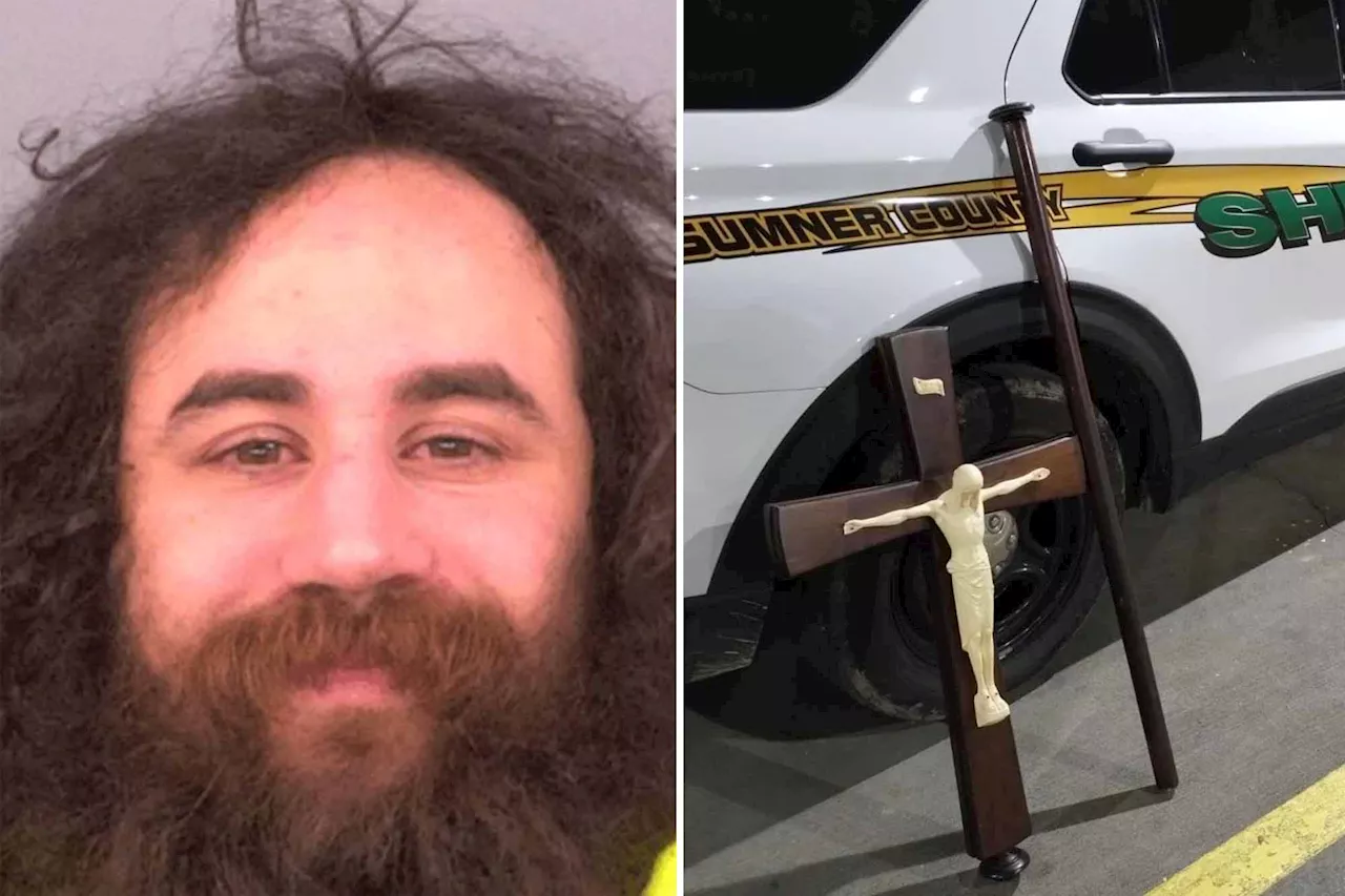 Bozo errantly calls 911 to his motel where he has 6-foot crucifix he stole from church tucked in his bed: authorities