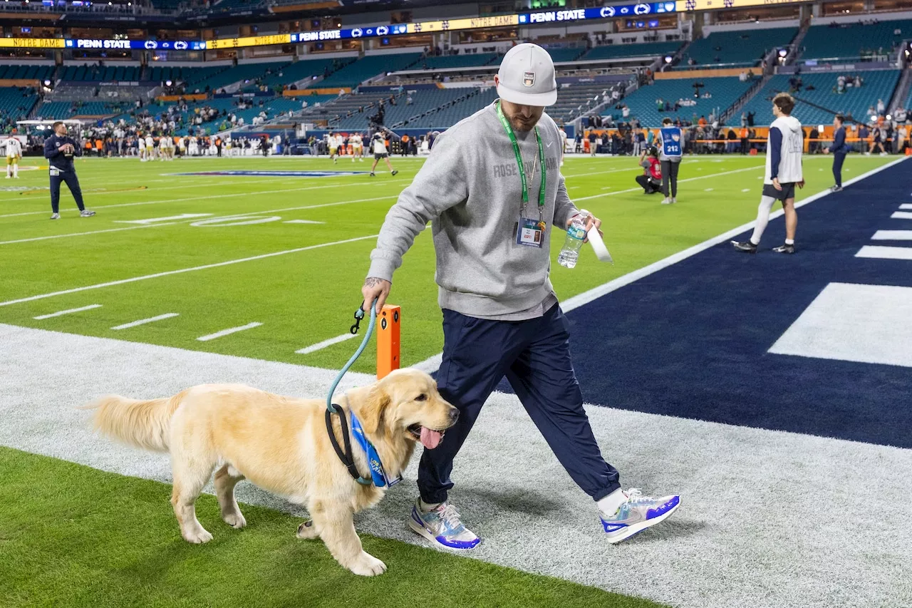 Kirk Herbstreit arrives at Orange Bowl for Penn State-Notre Dame with new star in tow