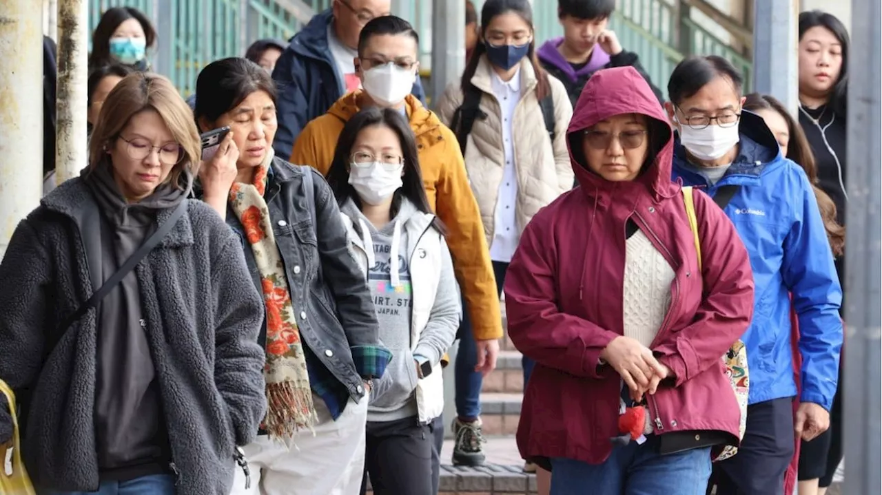 Flu outbreaks surge at Hong Kong schools as cold weather warning issued