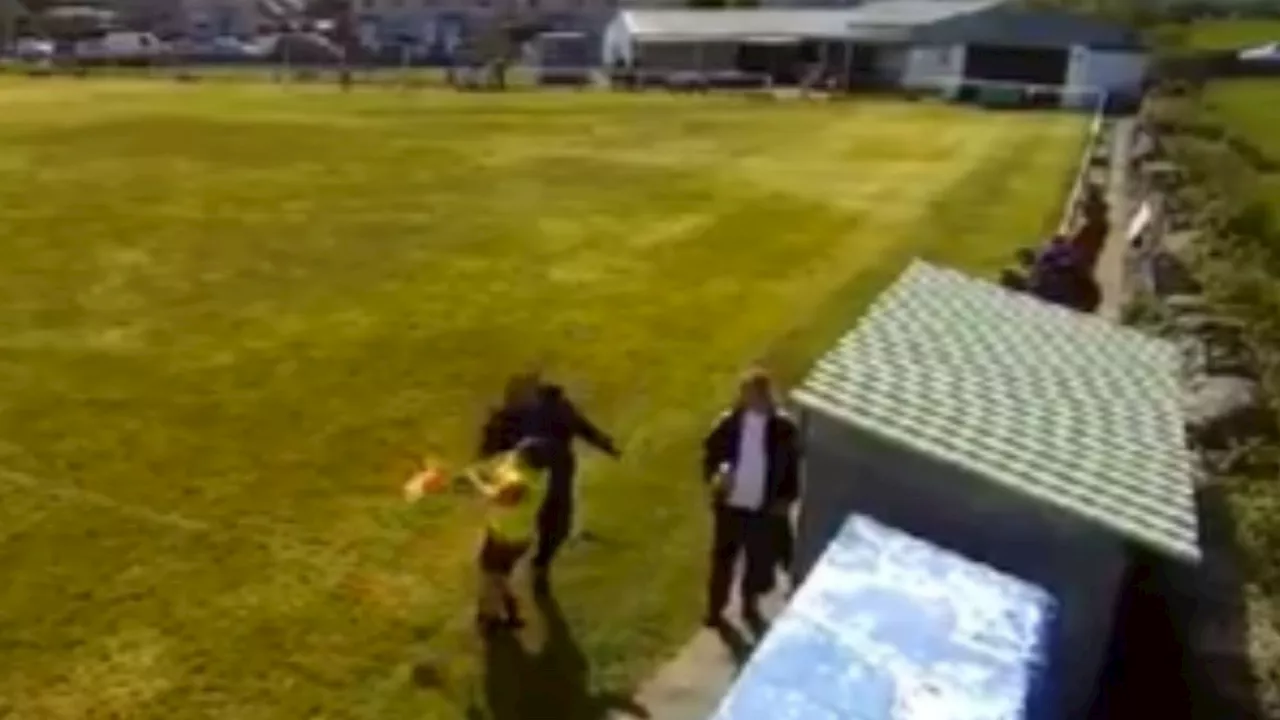 Shocking moment football coach, 43, punches teen linesman to the ground during 8-0 defeat