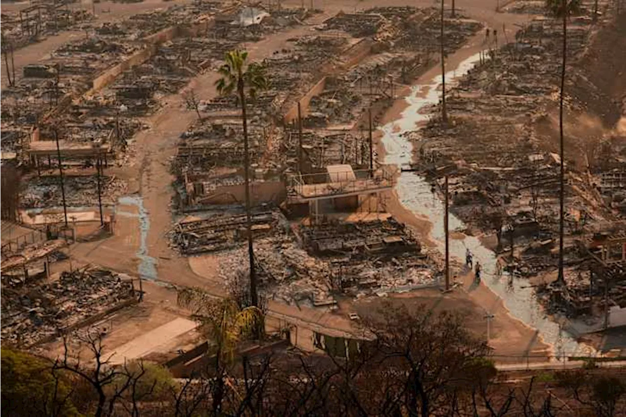 LA area's 2 biggest blazes burn at least 10,000 structures, while new fire leads to more evacuations