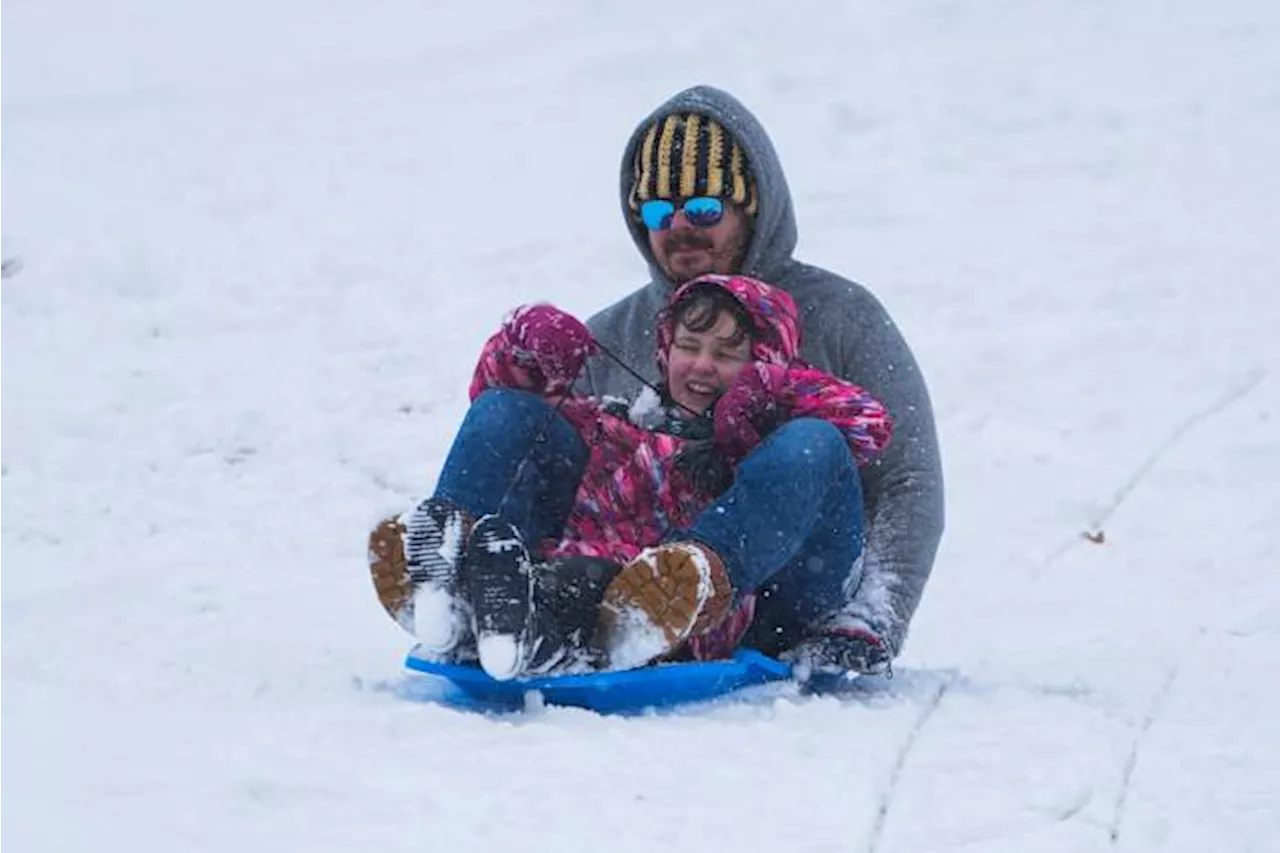 Winter storm lets Southern states enjoy a rare snow day