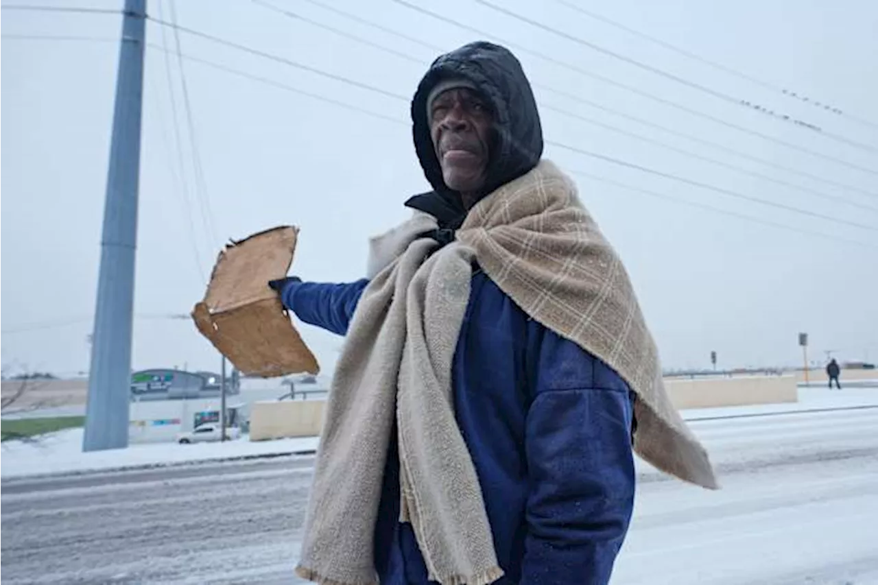 Winter storm plods into the Deep South, prompting states of emergency and school closures