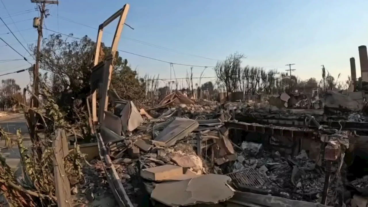 With their Los Angeles-area homes still smoldering, families return to search the ruins for memories