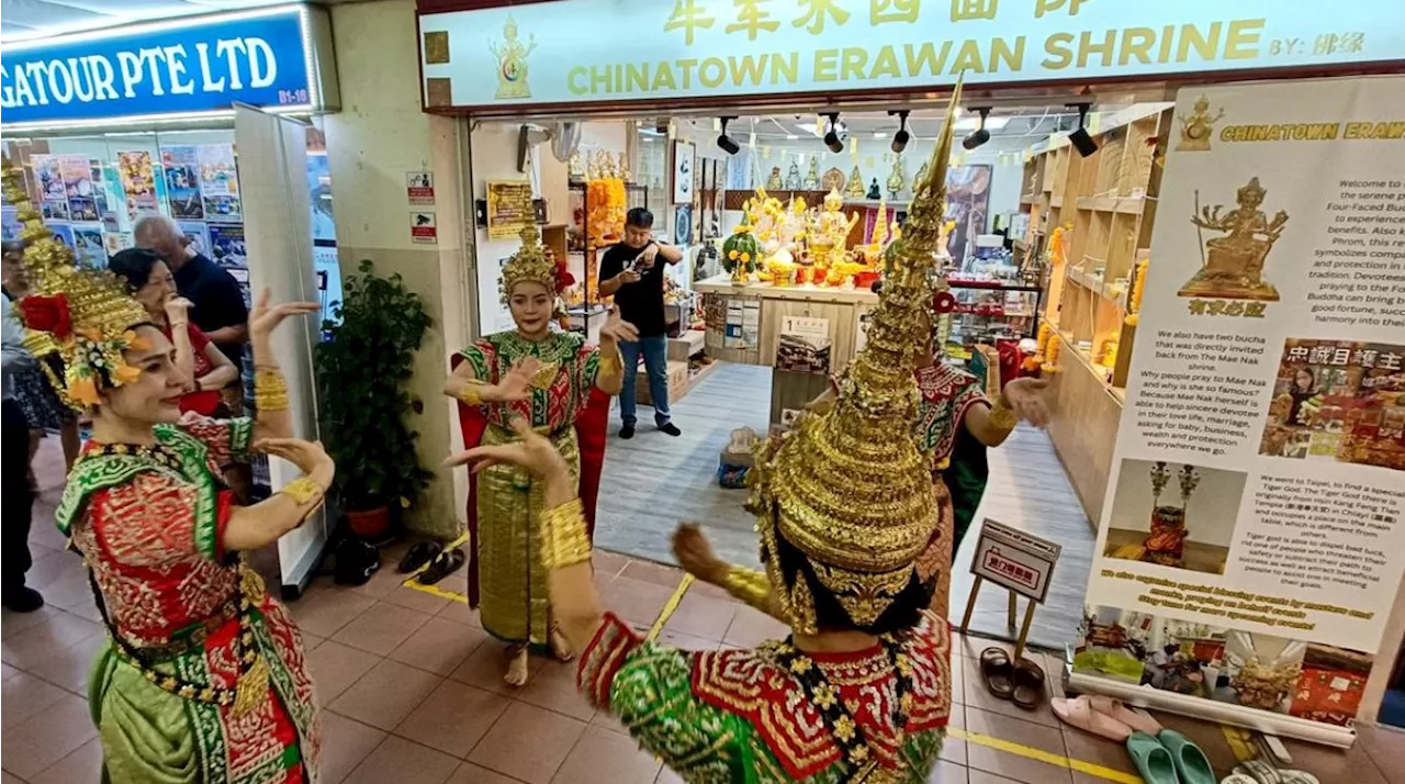 Woman hires traditional Thai dancers to express gratitude at Chinatown's Erawan Shrine after striking $130k Toto prize