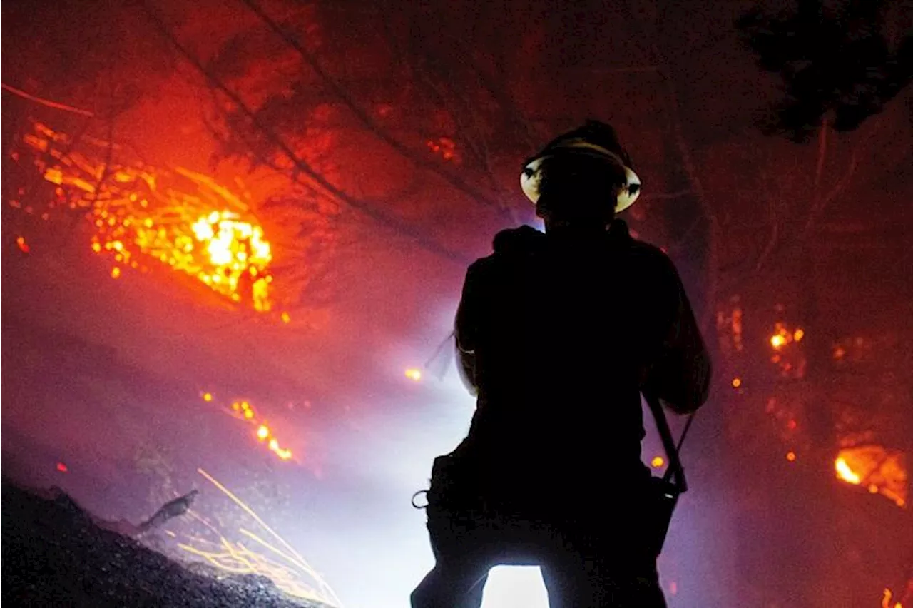 Los Angeles firefighters make progress as intense winds ease