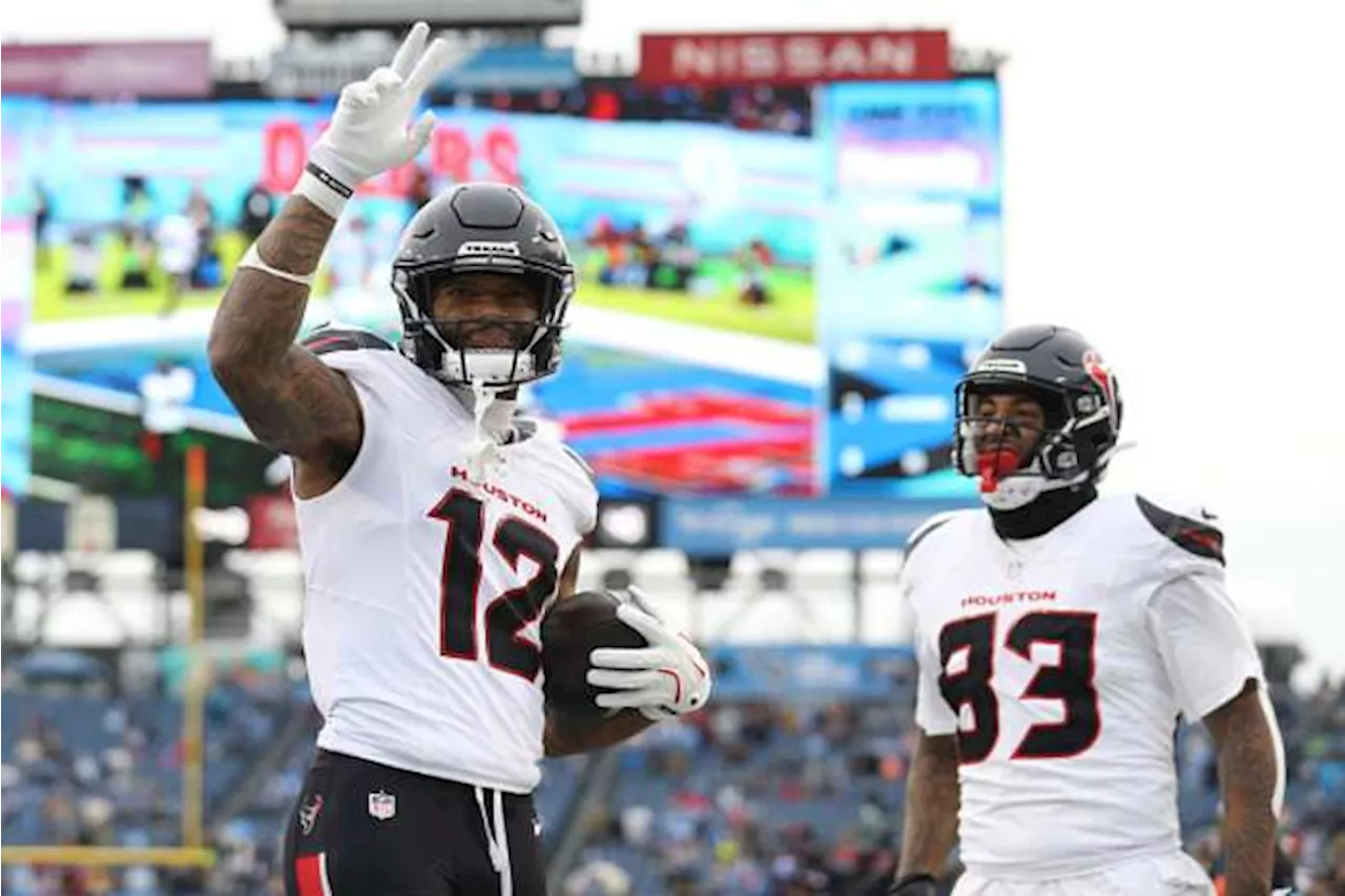 Nico Collins Celebrates Touchdown with Irv Smith Jr. Against Titans