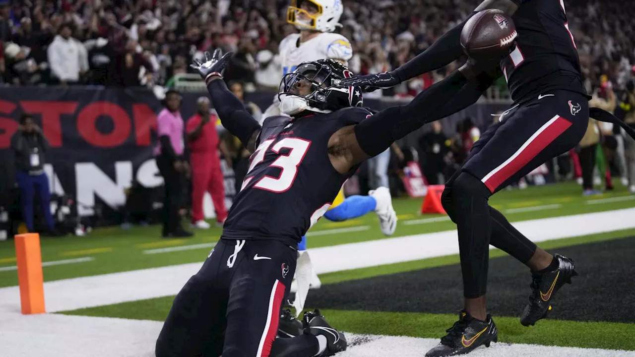 Texans intercept Herbert a career-high 4 times in a 32-12 win over Chargers in wild-card playoff