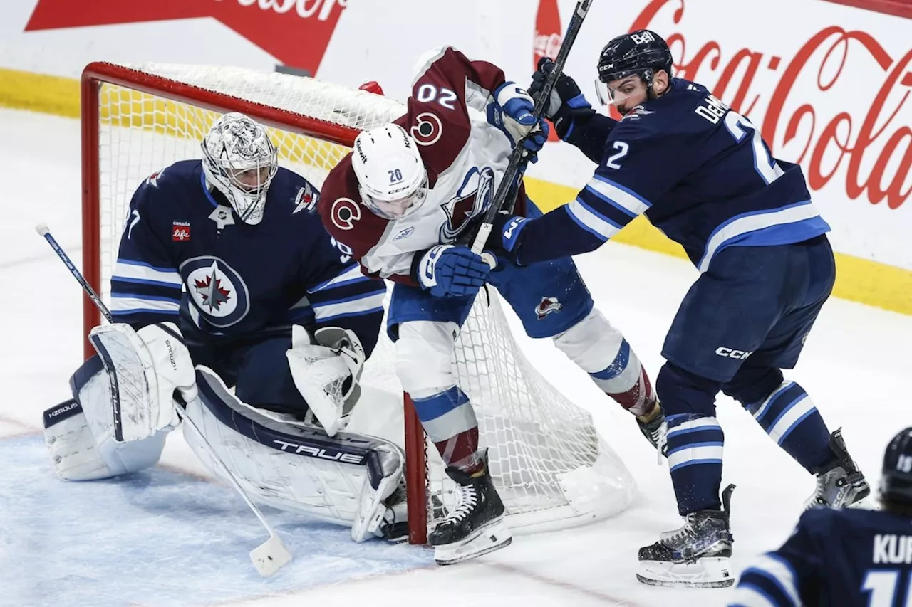 Hellebuyck Shines as Jets Blank Avalanche