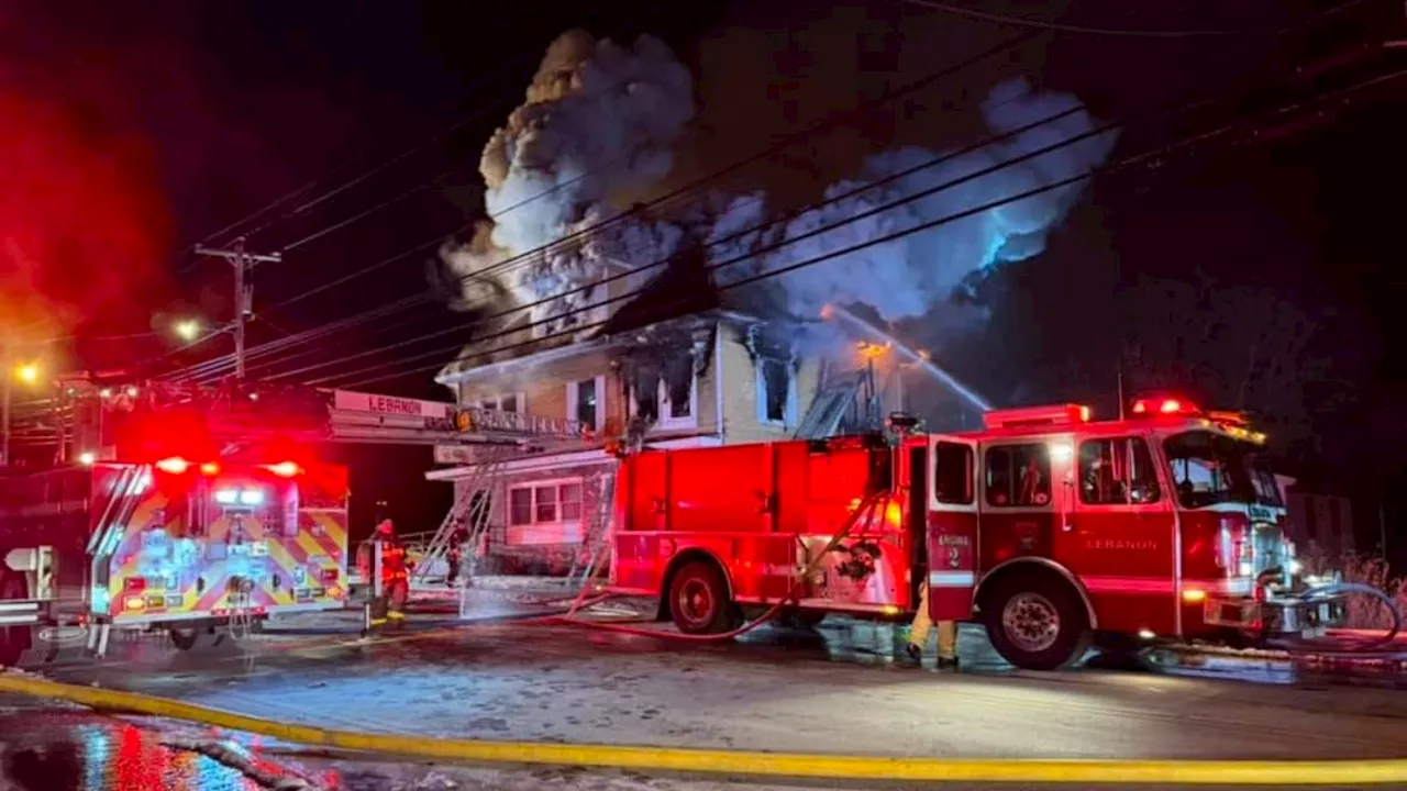 Lebanon Police Rescue Three from Burning Building Roof