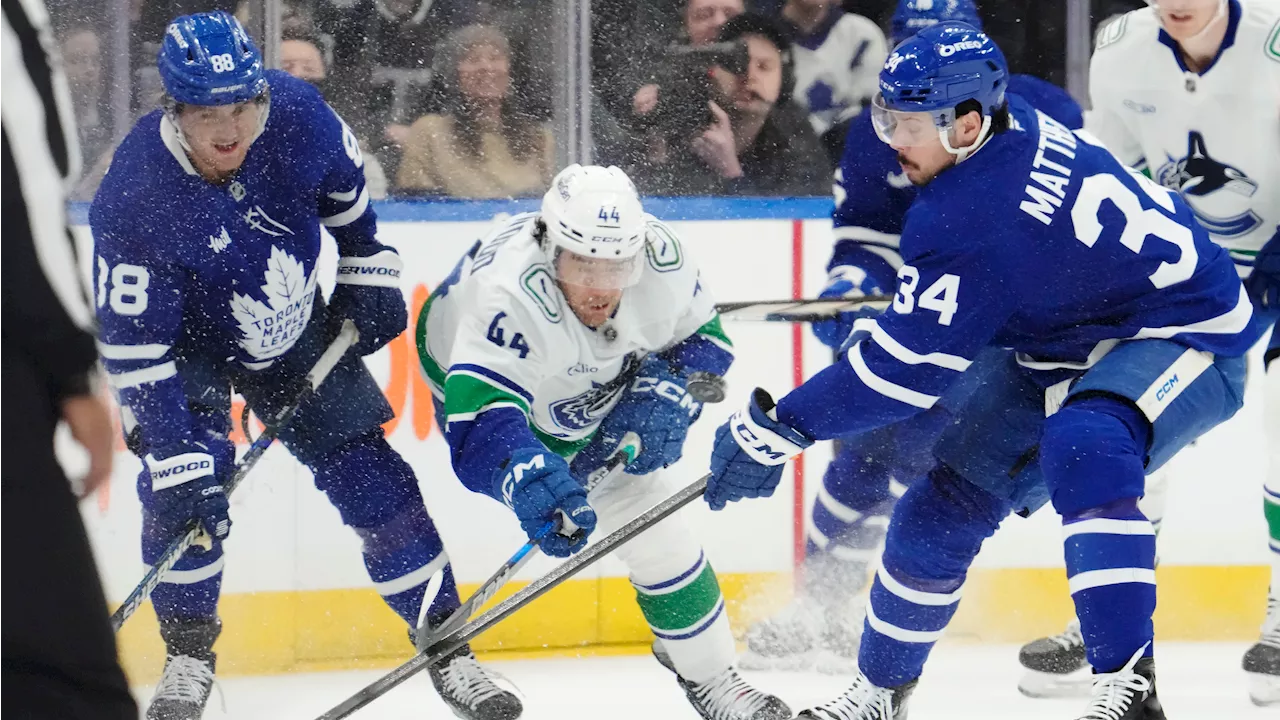 Canucks overcome road woes to down Maple Leafs