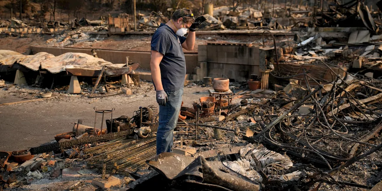 Death toll in Los Angeles wildfires rises as crews fight heavy winds to save homes, landmarks