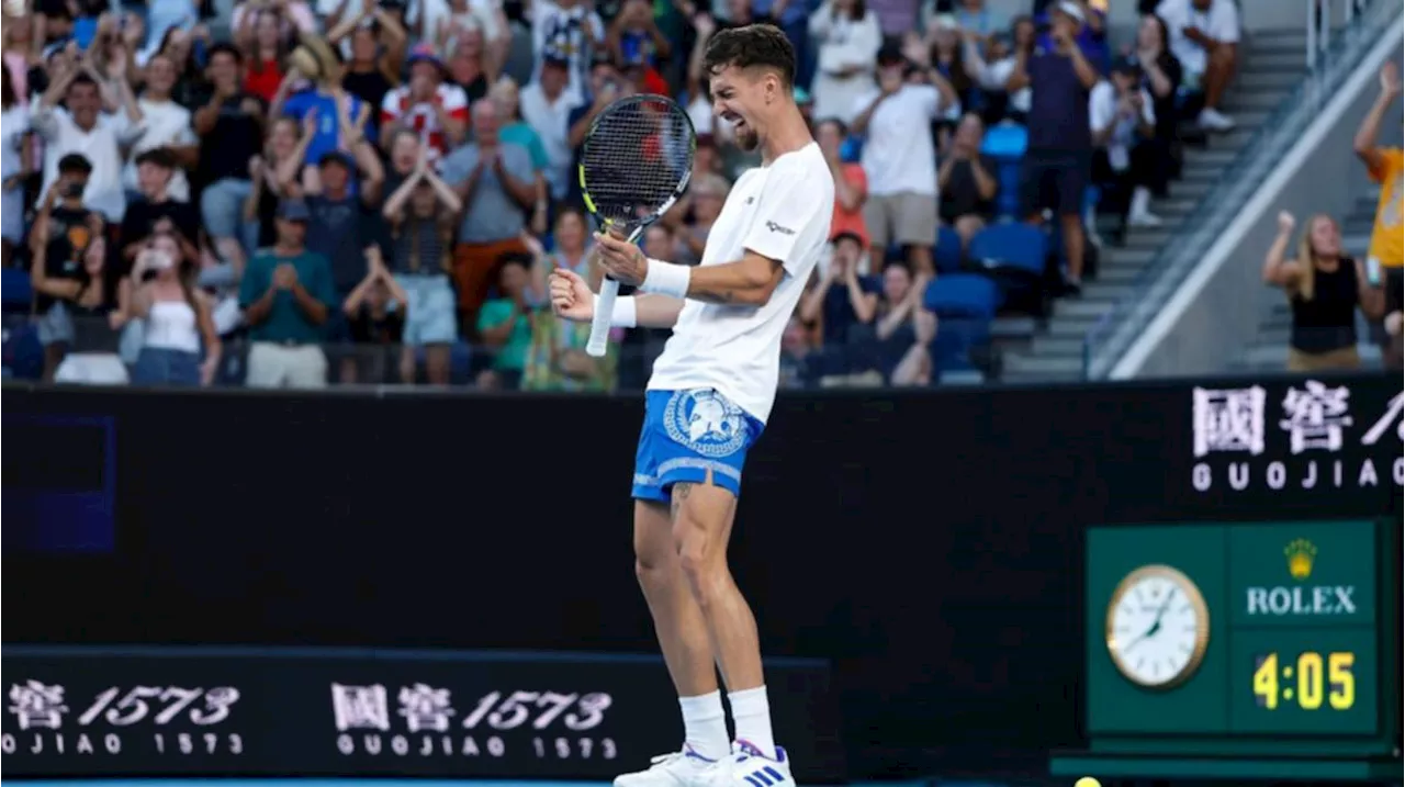 Aussie hero Thanasi Kokkinakis battles through pain to seal remarkable win at Australian Open