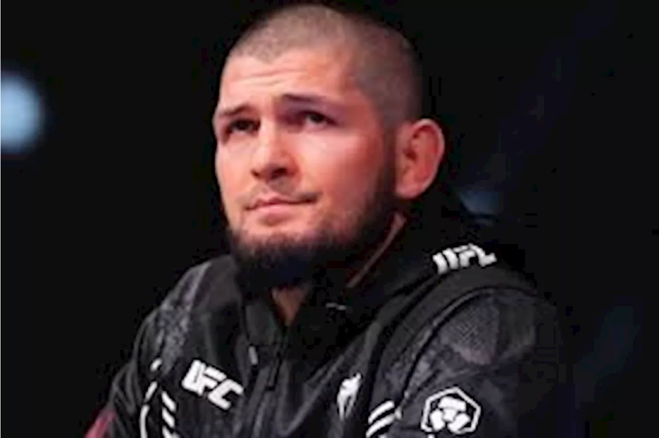 UFC legend Khabib Nurmagomedov escorted from a plane following a heated dispute with airline staff