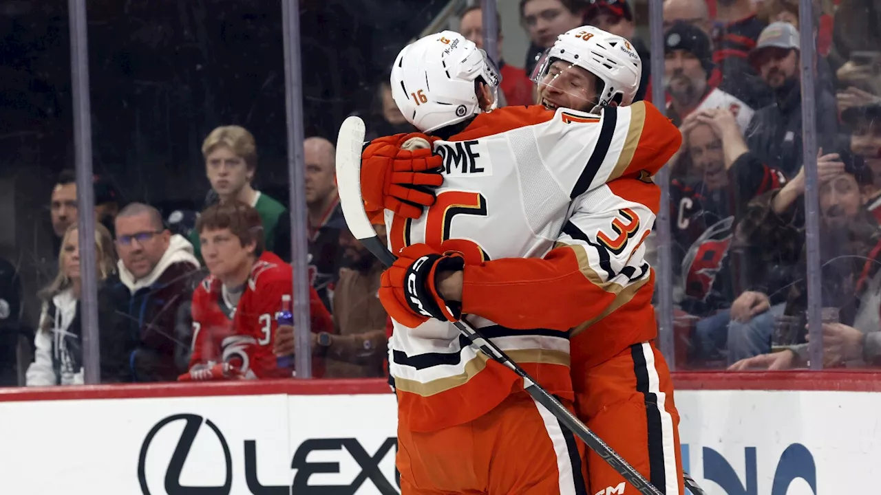 Cutter Gauthier scores twice, including in OT, to lift the Ducks over the Hurricanes 3-2