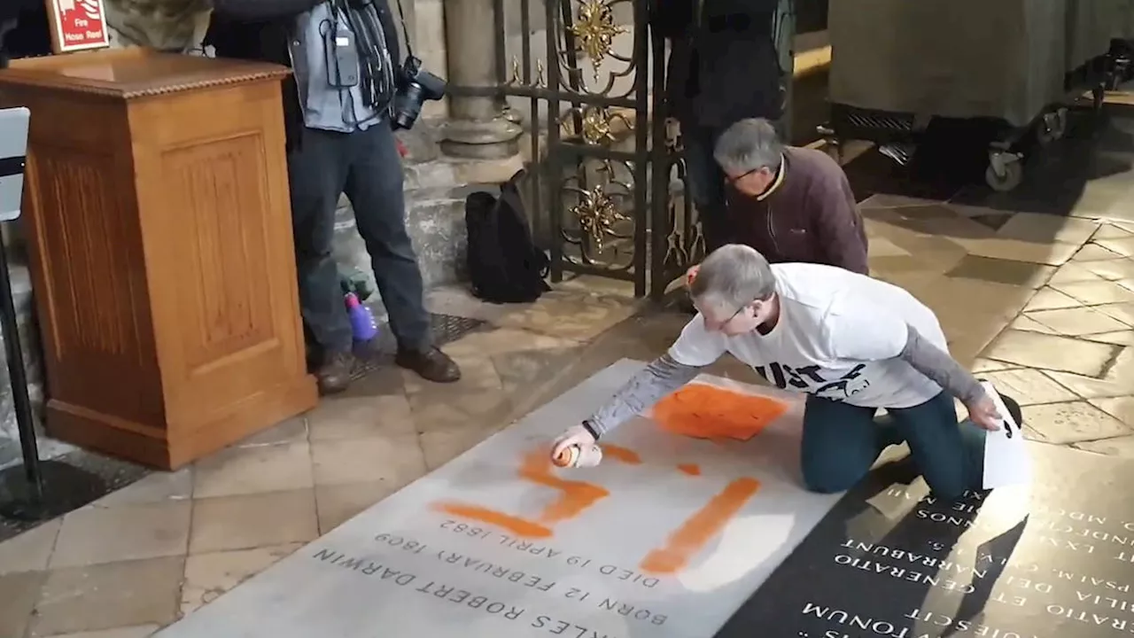 Eco activists Just Stop Oil deface Charles Darwin’s grave in Westminster Abbey in latest fossil fuel protest