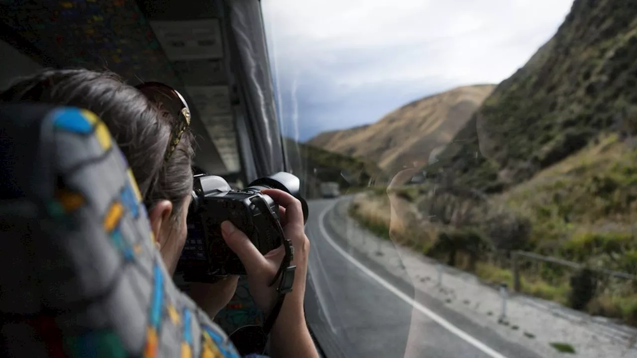 I travelled New Zealand by bus - it made my bucket list adventure cheaper and more fun